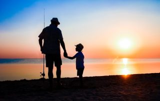 father and son enjoying a spring fishing trip